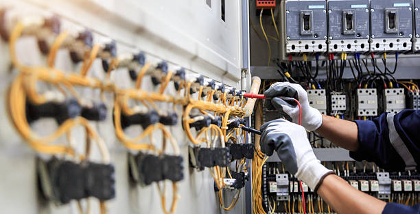 Professional Electrician technician working in Bellair-Meadowbrook Terrace, FL
